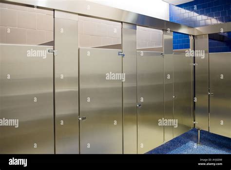 Public Bathroom Stalls All Occupied Stock Photo Alamy