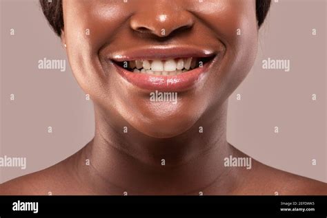 Closeup Portrait Of Beautiful African American Woman With Perfect Smile