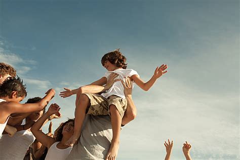 Best Lifted Up On Shoulders Stock Photos Pictures And Royalty Free