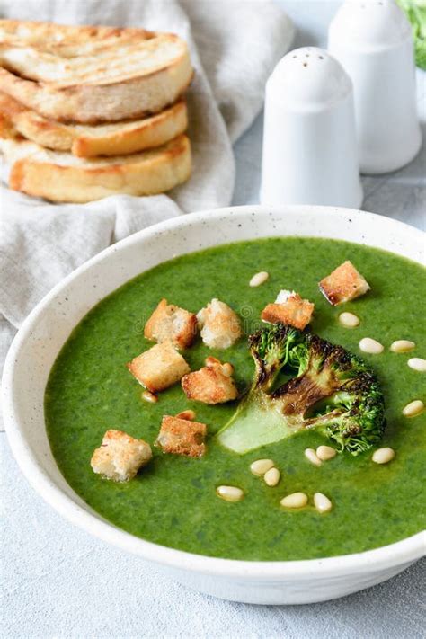 Broccoli Cream Soup With Croutons In White Bowl Closeup View Stock