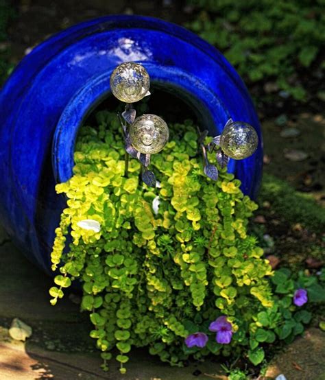 The whole is intimately combining with greenery. 22 Best Spilled Flower Pot Ideas and Designs for 2021
