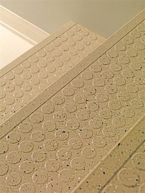 It's naturally slip resistant and provides outstanding underfoot comfort and noise reduction. raised design rubber tread - Roppe