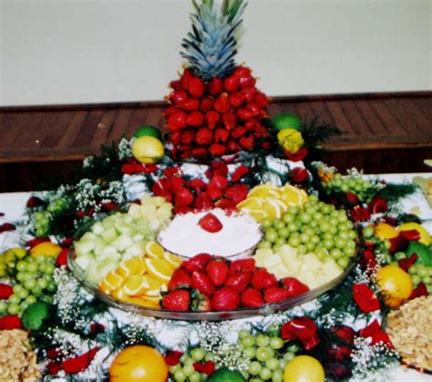 Fruit Display With A Large Fruit Tray And Dip And A Strawberry Tree In