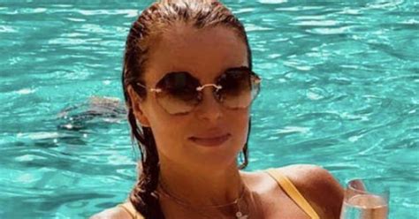 Amanda Holdens Eye Popping Curves Erupt Out Of Miniscule Bikini