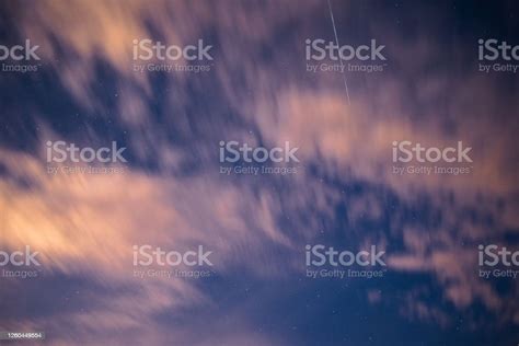 Blue Night Sky With Clouds And Stars Stock Photo Download Image Now