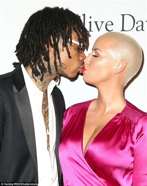 Nick Cannon And Amber Rose Kissing