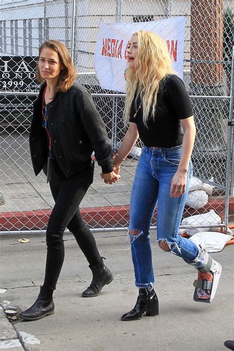 Amber Heard Dating Bianca Smiling Amber Heard Arrives Back At Her