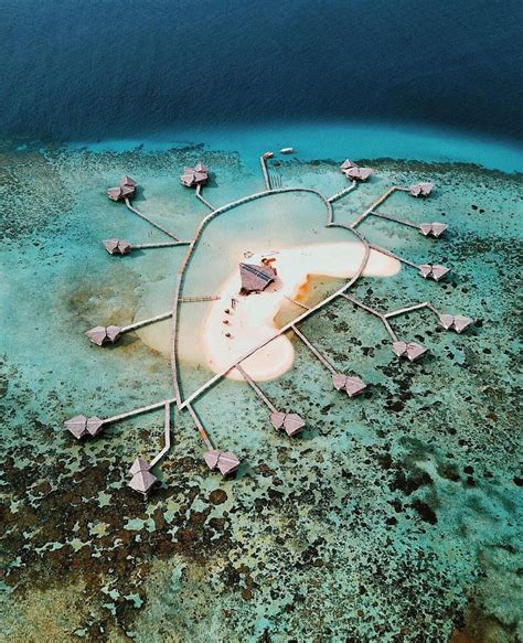 Listriknya bersumber 100% dari solar panel, organic toiletries product, sistem pembuangan limbah yang tidak langsung ke laut. A breathtaking aerial view of Pulo Cinta Eco Resort in ...