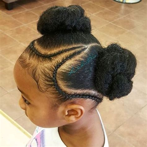 A trendy and cool hairstyle for women with afro hair is a bun with cornrows braided into it. Black Girls Hairstyles and Haircuts - 40 Cool Ideas for ...