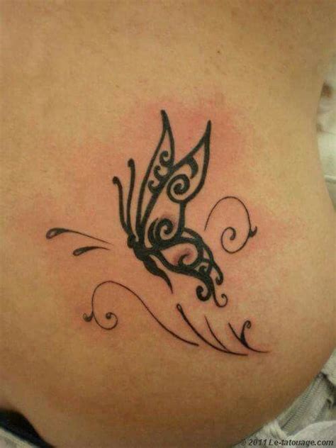 Épinglé sur tatouage papillon dos