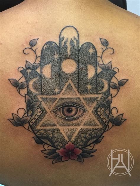 It is a timeless star full of history, which gives meaning to our past, our present, and our future. Awesome Hamsa Eye With Star David Tattoo On Upper Back ...