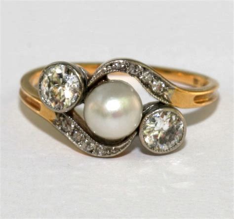 Victorian Pearl And Diamond Twist Engagement Ring