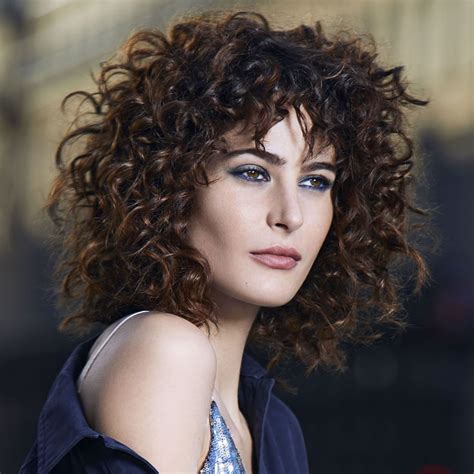 Curly hair has a mind and a personality of its own. 20 Elegant Natural Curly Hairstyles for Women in 2020 ...