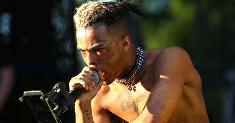 The moment rapper xxxtentacion was shot dead at the wheel of his bmw has been shown to the trial of four men charged with his murder. XXXTentacion Fights His Dead Body in Posthumous 'Sad!' Video