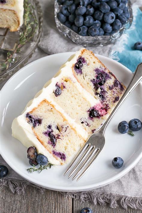 This banana cake using cake mix is positively delicious, easy to make and is topped with an amazing banana flavored whipped cream frosting! Blueberry Banana Cake with Cream Cheese Frosting | Liv for ...