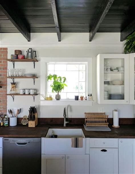 If you follow interior design trends, chances are that you know how popular modern farmhouses are right now, especially the kitchen cabinets are custom made. Affordable Farmhouse Kitchen with Slate Appliances Ideas 1 ...