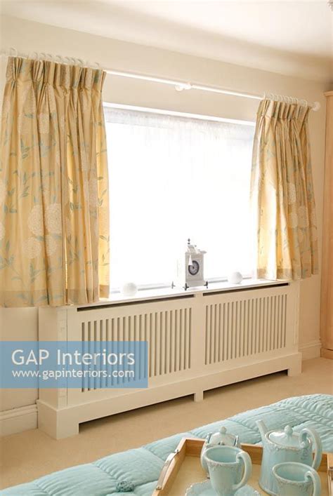 Are you looking for window coverings for your home but can't decide which to choose? GAP Interiors - Radiator cover under window - Image No ...