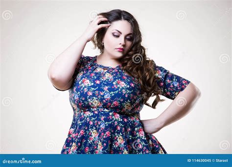 Plus Size Fashion Model In Casual Clothes Fat Woman On Beige