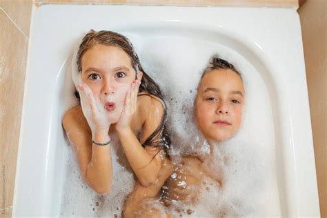 Girl And Boy Taking A Bath By Dejan Ristovski