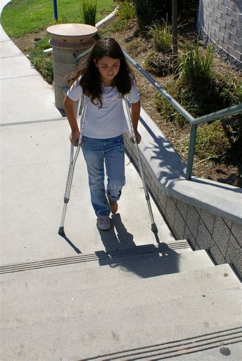 Young Girl With Crutches At Steps Stock Photo Image Of Crutches