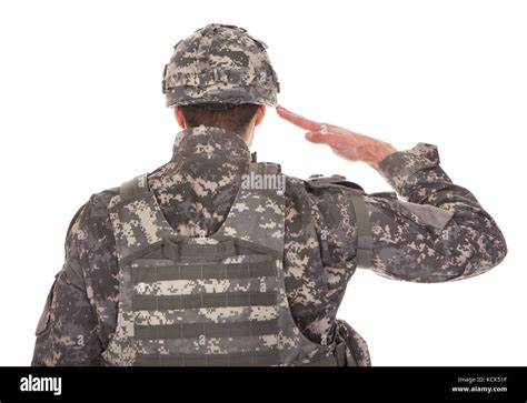 Man In Military Uniform Saluting Over White Background Stock Photo Alamy