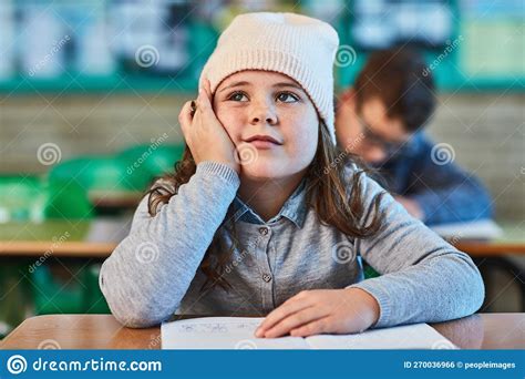 Daydreaming In Class An Elementary School Girl Daydreaming In The