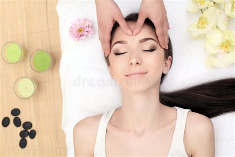 Face Massage Close Up Of A Young Woman Getting Spa Treatment Stock