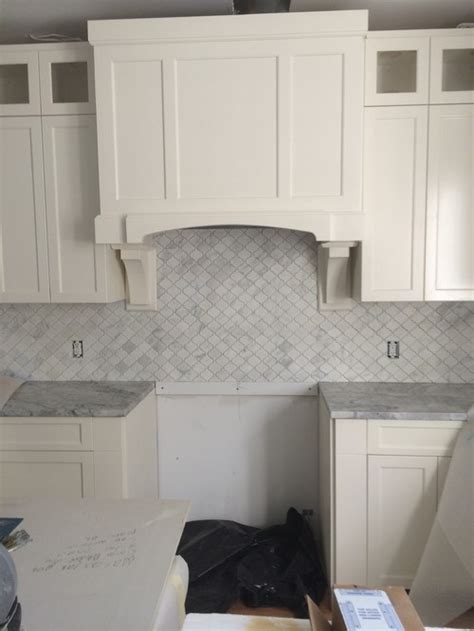 The tile was by cobsa and the color was bianco carrara select, the box said statuary? wrong grout on bianco carrara marble