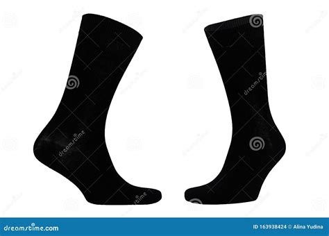 Blank Black Cotton Long Socks On Invisible Foot Isolated On White Background As Mock Up For