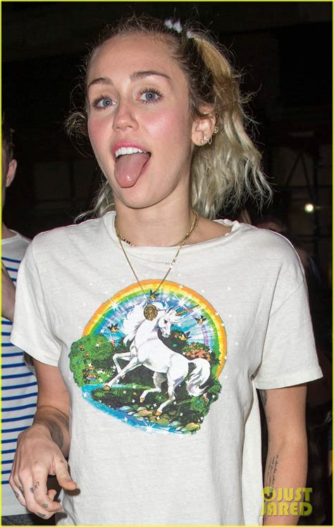 Miley Cyrus Flashes Her Tongue And A Peace Sign Ahead Of Snl Photo