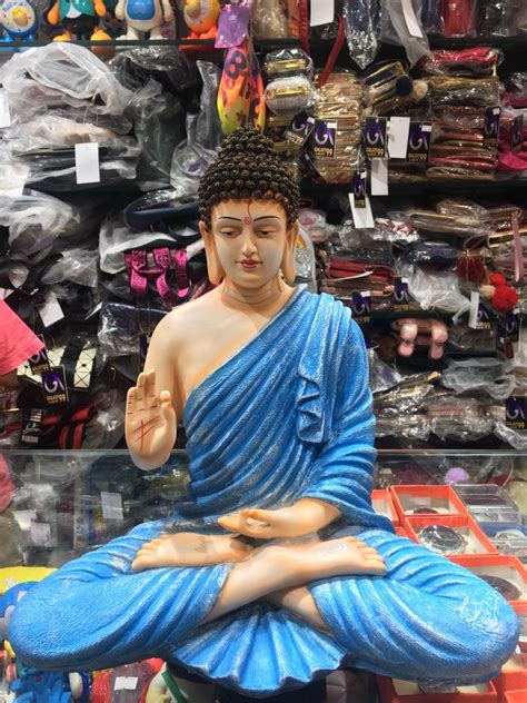 There was a giant ikea kitchen in the center, and three dark little bedrooms, and a hallway in the back. Buddha statue for home decor