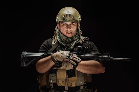 Premium Photo Soldier Or Private Military Contractor Holding Sniper