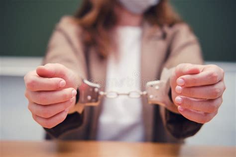 Teacher In Handcuffs Concept Of Crime And Arrest Of Teachers Stock