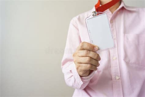 Man Holding Id Card Stock Photo Image Of Attachment 103048106