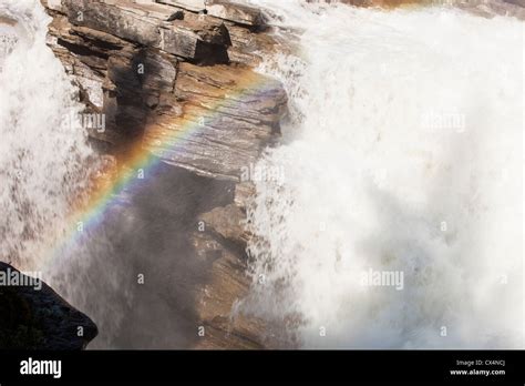 A Rainbow In Athabasca Falls Near Jasper Canadian Rockies Stock Photo