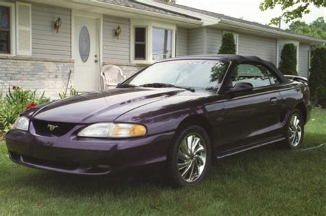 A new security system was made standard on all models, and a new interior upholstery. Deep Violet Thistle Purple 1997 Ford Mustang GT ...