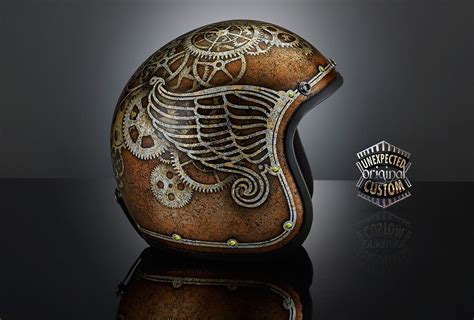 A Motorcycle Helmet With Intricate Designs On The Front And Side