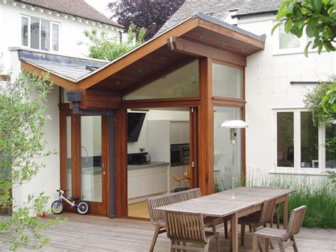 One side opens on a simple hinge, allowing access to the inside for cleaning or for mounting it to a post. Butterfly roof | Swell Dwellings | Pinterest | Single ...