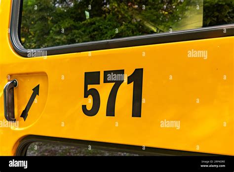 Rear Of A Parked Yellow School Bus Number 671 Stock Photo Alamy