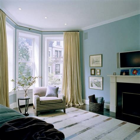 With the large, sweeping windows in the room, it's best to have long curtains to yellow walls like these ones highlight all the features incorporated in the room design. Pin by Anastasia Hughes-Myrick on recover chairs projects ...
