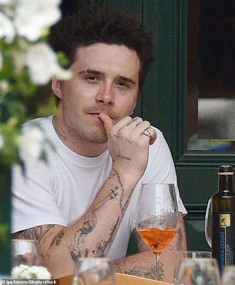Brooklyn Beckham Gets His Middle Name Joseph Inked Across His Left Arm