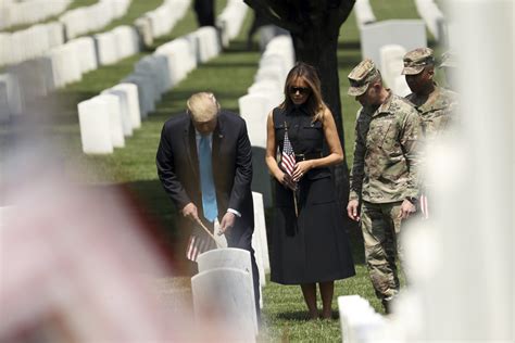 President Trump And First Lady Visit Arlington Cemetery To Pay Their Respects To Americas