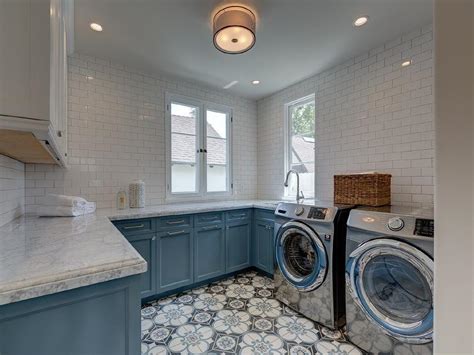 This guide will give you laundry storage ideas. White and Blue Laundry Room Cabinets - Transitional ...