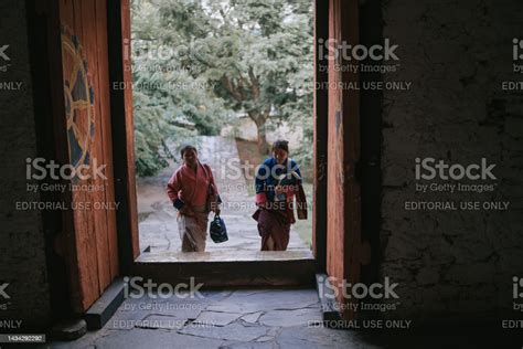 2 traditional clothing bhutanese women leaving punakha dzong on october 7th year 2022 stock