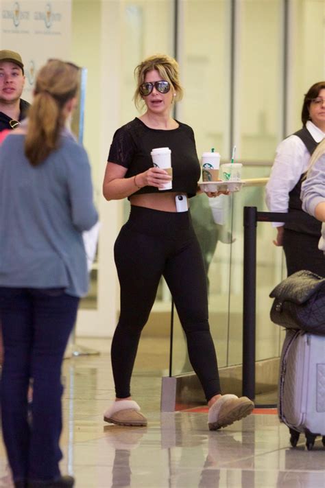 Kim Zolciak In Tights Arrives Back To Atlanta After A Trip To Germany 3 20 2017