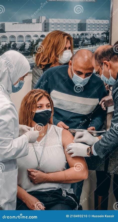 Lebanese Minister Of Public Health Vaccinating First Lebanese Citizen