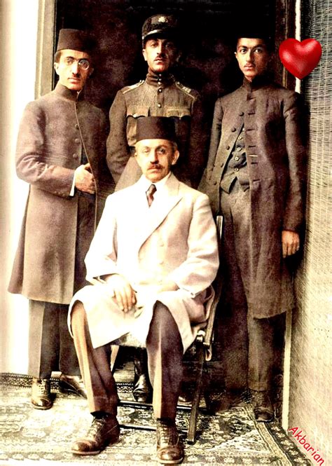 An Old Photo Of Three Men In Uniform Standing Next To Each Other And