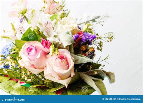 Photo Of Romantic Bouquet Of Pink Roses Lilies Green Leaves On White