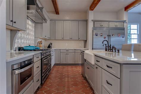 I think the only area that was untouched were the saltillo tiles in the foyer. Kitchen- Saltillo Floor Tile - Traditional - Kitchen ...