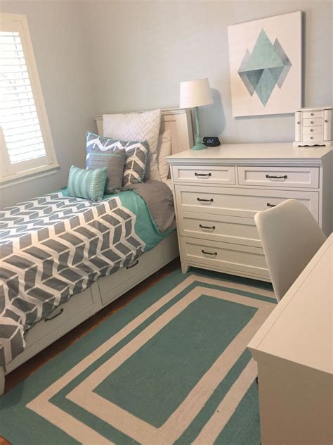 Give your bedroom a hotel feel with cozy white sheets and an assortment of complementary throw pillows. My new bedroom! It's a very small room, but we made it ...